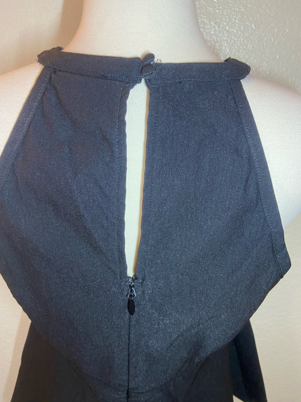 Torrid Caged High Neck
Peplum Top in black. Size:00(M) - Picture 4 of 11